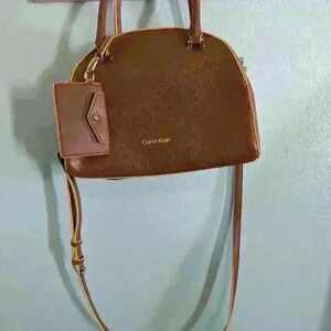 Beautiful Calvin Klein tan and yellow convertible hand or shoulder bag